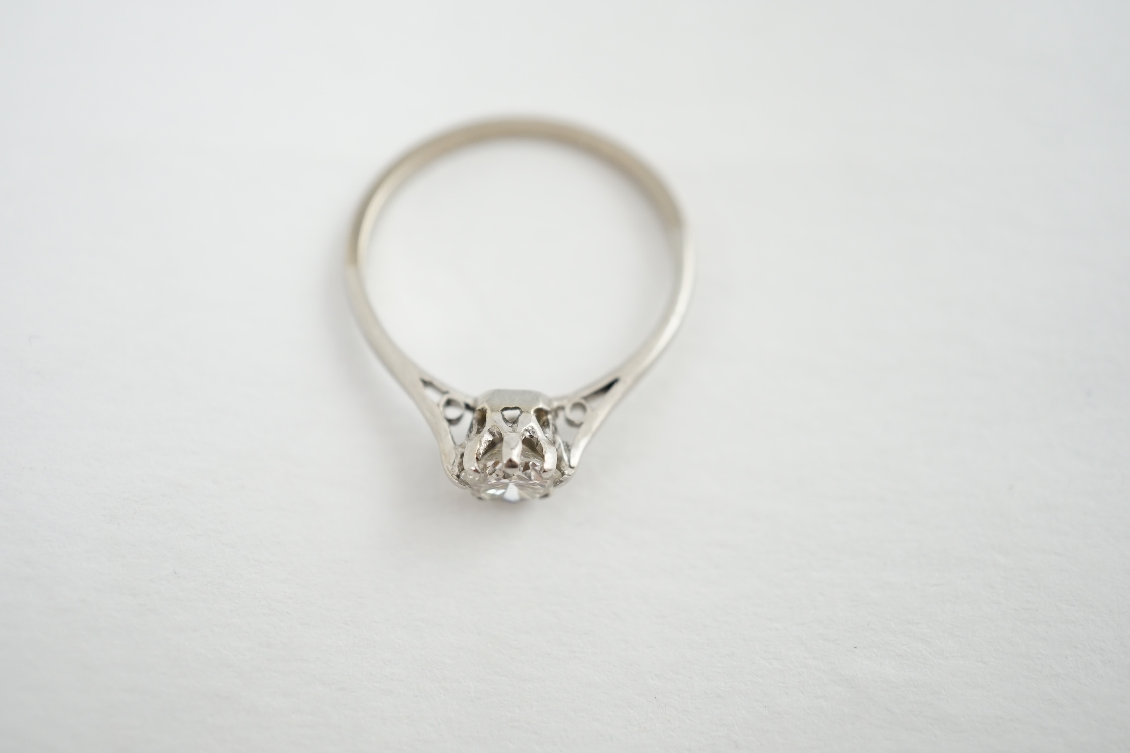 A platinum and solitaire diamond set ring